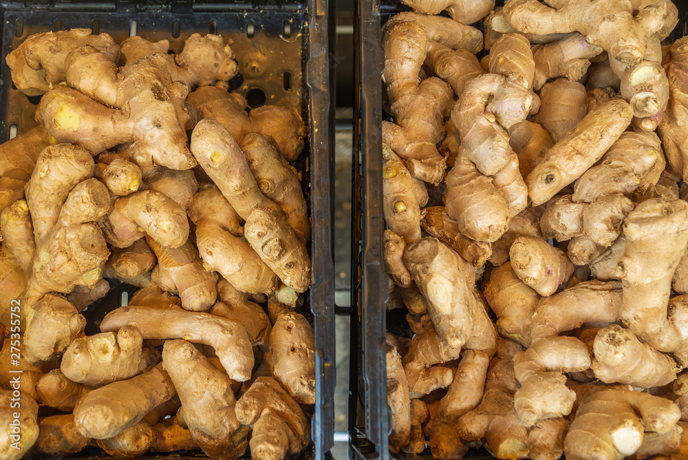 Top view heap of gingers in plastic box in super market. Top view heap of gingers in plastic box in super market.