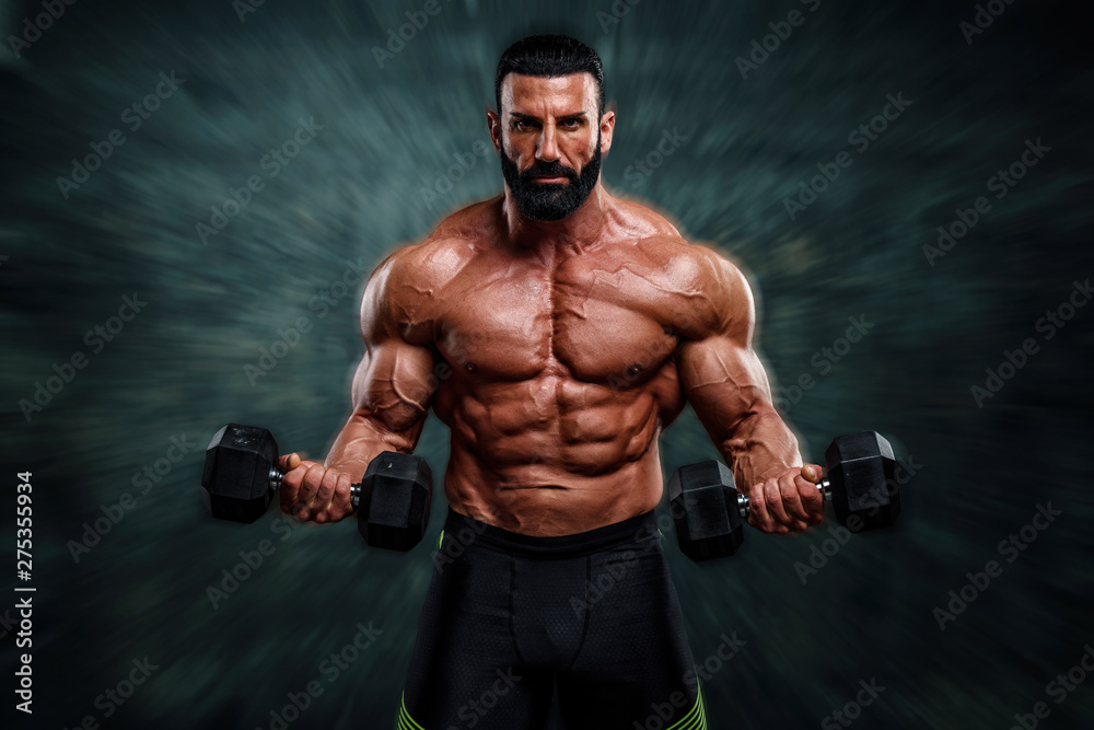 Handsome, Strong , Muscular Body Builder Lifting Weights