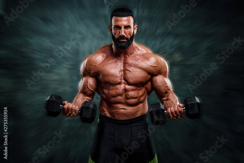 Handsome, Strong , Muscular Body Builder Lifting Weights © mrbigphoto