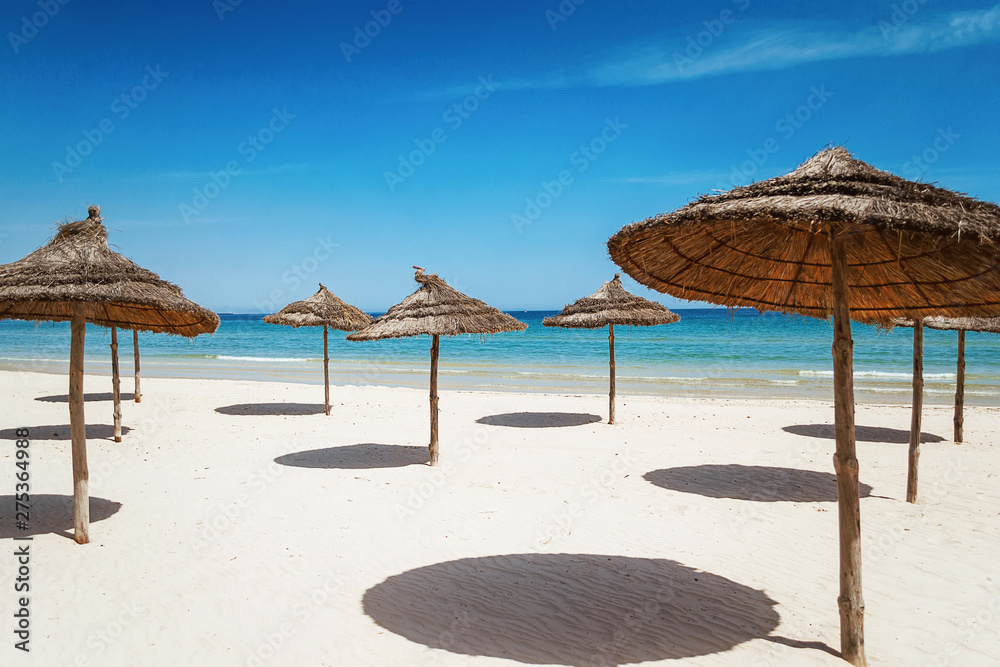 Sandy beach near the sea. Summer vacation and travel concept. Copy space