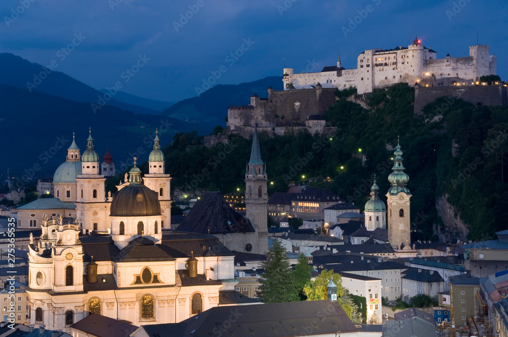 Europe, Austria, Saltzburg, cityscape showing Schloss Hohensalzburg dusk