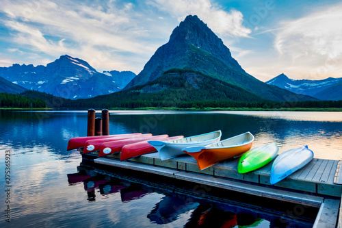 Fotografija Boats on Dock by Lake in Mountains