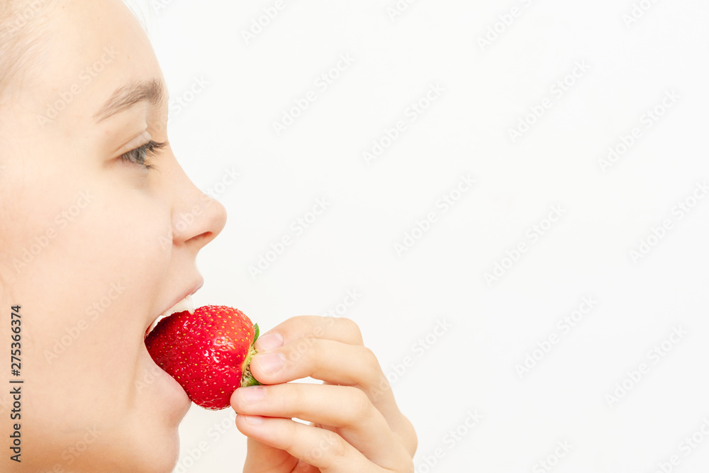 Portrait of yaung woman eating strawberries. Healthy happy smiling woman eating strawberry. Healthy, lifestyle concept. Portrait of yaung woman eating strawberries. Healthy happy smiling woman eating strawberry. Healthy, lifestyle concept.