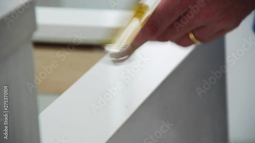 Handyman measuring a surface for a new installation. photo