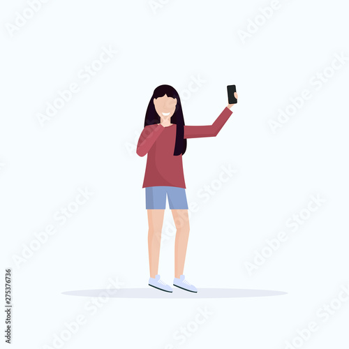 brunette woman taking selfie photo on smartphone camera casual female cartoon character posing white background flat full length