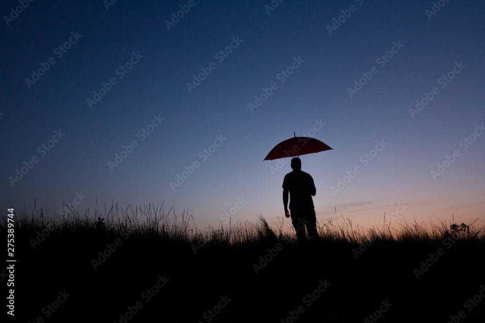 silhouette of man with umbrella silhouette of man with umbrella