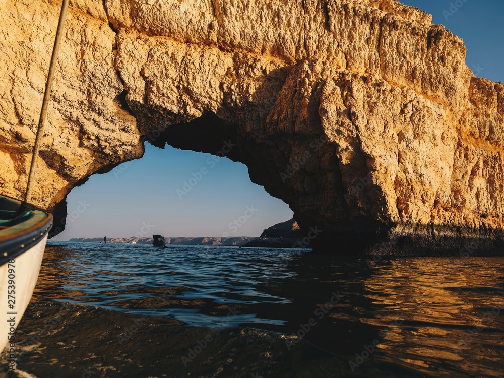 cave arch in the center of the sea in Muscat Oman