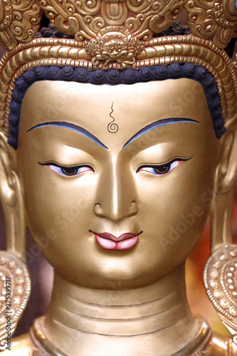 Golden Buddha face At the temple in Bhutan