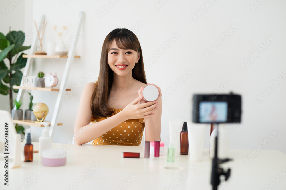 Asian beauty blogger recording video at home Asian beauty blogger recording video at home