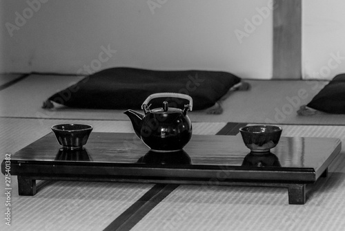 Japanese Tea in the clay pot over tatami