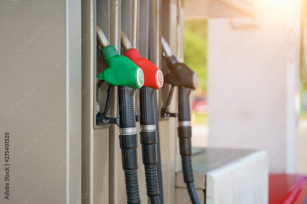 Photo of refueling with colorful pistols on summer Photo of refueling with colorful pistols on summer