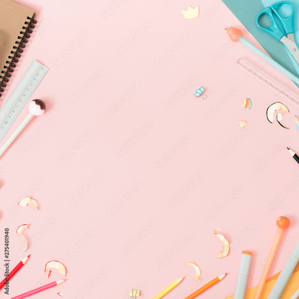 Colorful stationery on pastel pink background, school concept Colorful stationery on pastel pink background, school concept