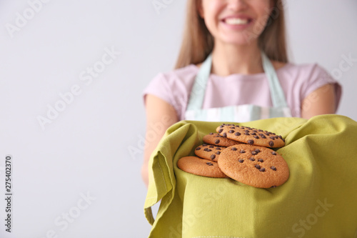 Beautiful female baker with...