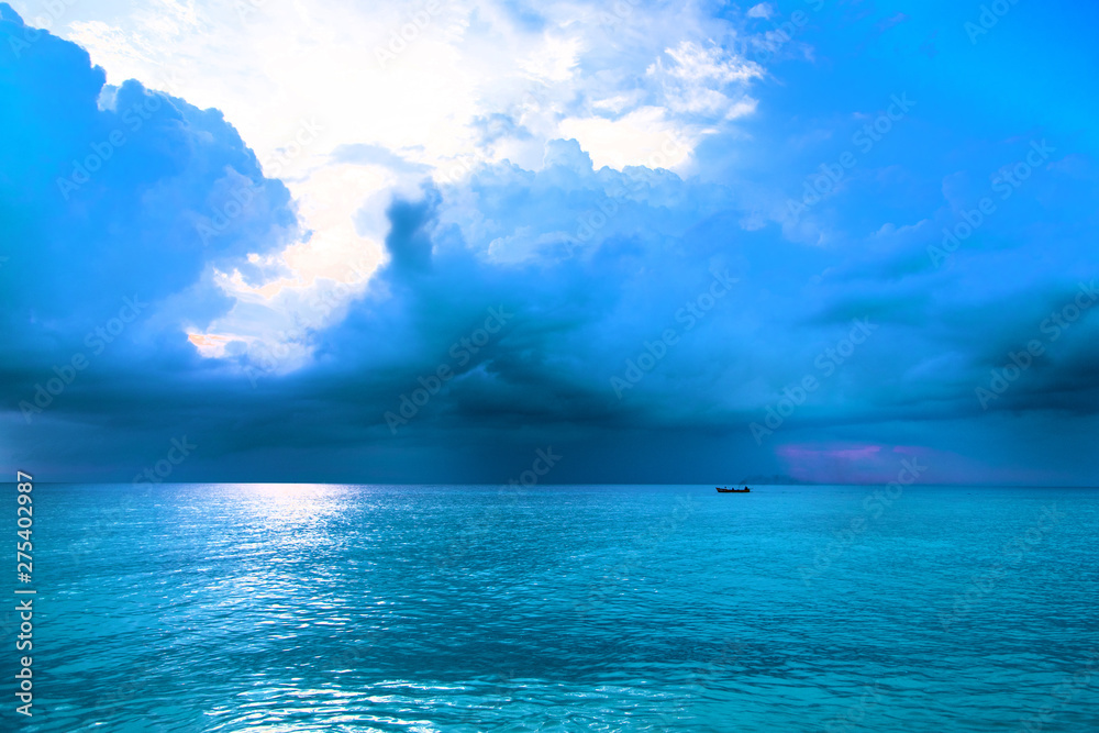 sea and sky and boat or dinghy sea and sky and boat or dinghy