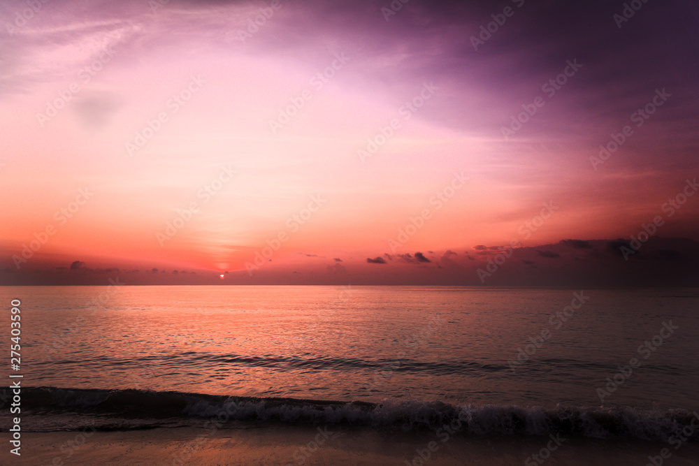 sunrise pink purple sky and beach