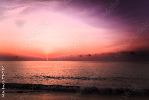 sunrise pink purple sky and beach