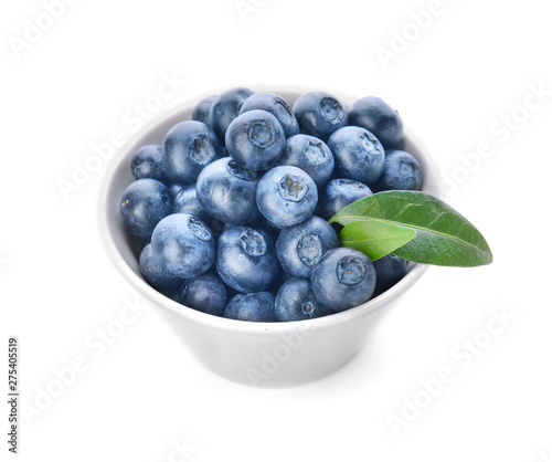 Bowl with ripe blueberry on white background