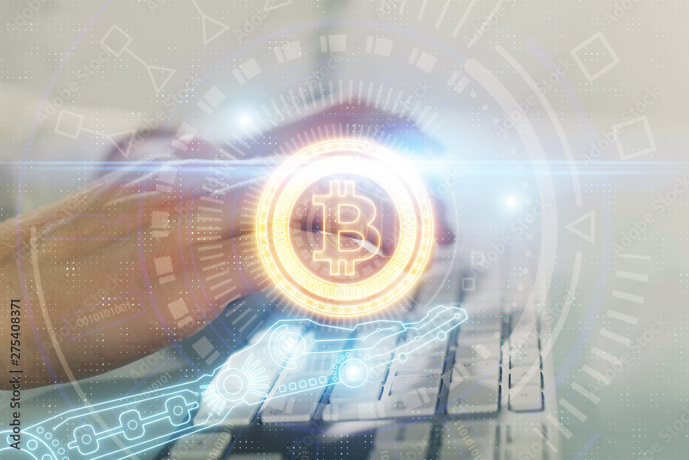 Crypto currency theme hologram with businessman working on computer on background. Concept of blockchain. Multi exposure. Crypto currency theme hologram with businessman working on computer on background. Concept of blockchain. Multi exposure.