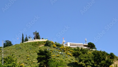 Kuzum Baba hill, Vlore / Vlora, Albania. Hill. Natural terrace carved out by sea waters with temple of Kuzum Baba (the centre of the Bektashi sect) and restaurant with spectacular viewpoint photo