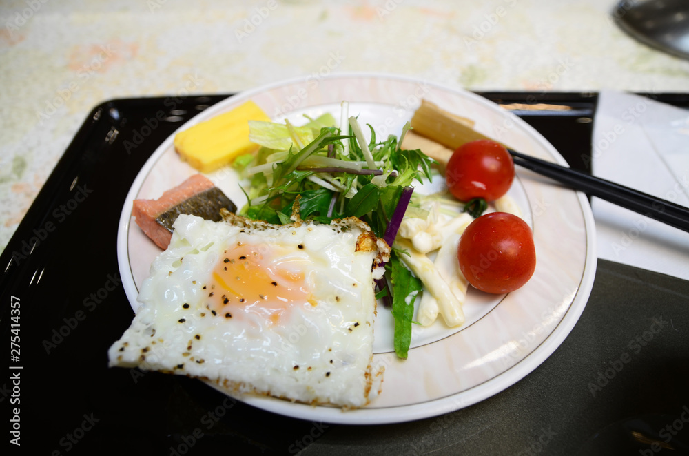 Healthy breakfast with egg, tomato, vegetable and salmon. Healthy breakfast with egg, tomato, vegetable and salmon.