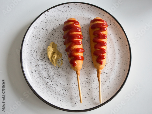 Corn dogs and mustard sauce
