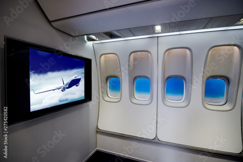 Passenger cabin interior in the view of Monitor and porthole