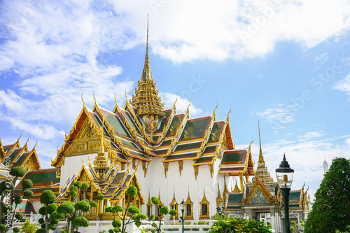 Wat Phrakeaw or Wat Phra Si Rattana Satsadaram,The beautiful of the pagoda and blue sky,The temple in the Grand Palace Area,Bangkok,Thailand. © thanin
