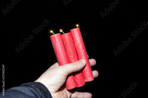 Photography Silvesterknaller in Hand halten
