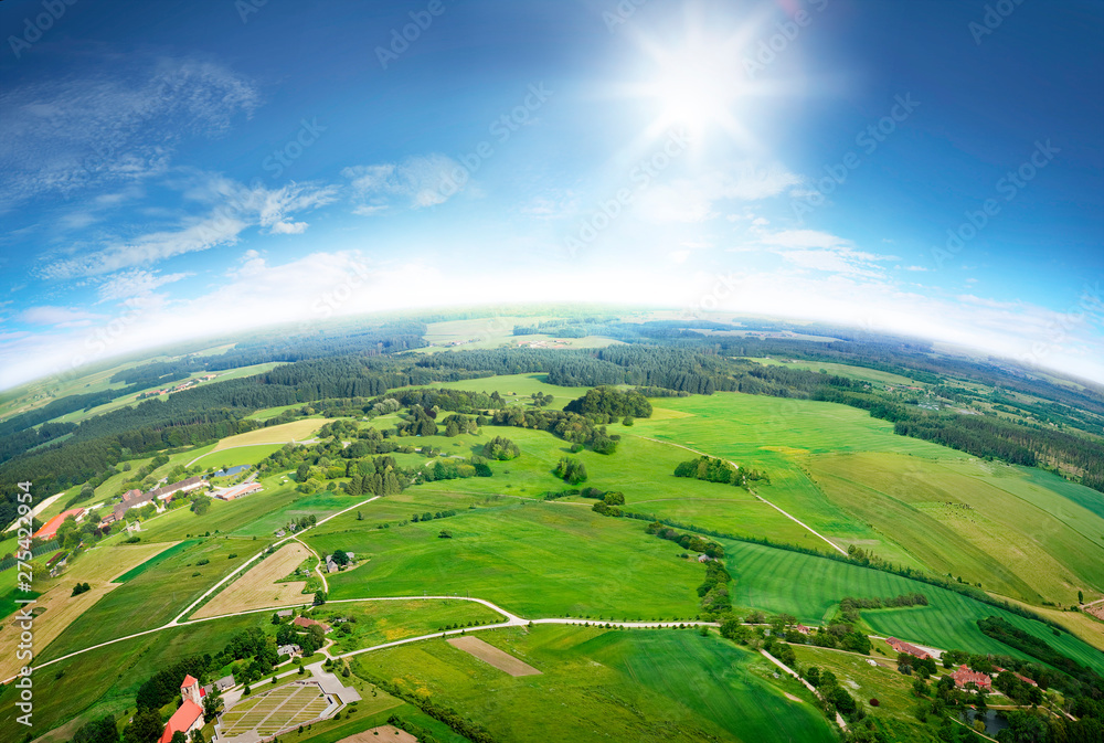 Aerial view the great countryside during summer day on background of white clouds blue sky