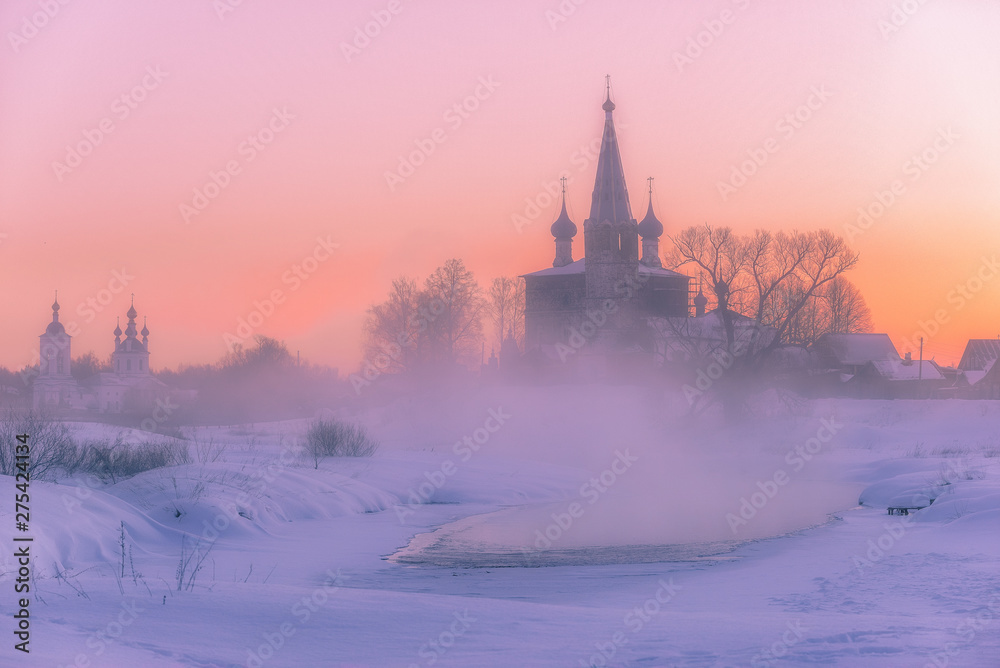 Frosty March morning in the village Dunilovo on the river Teza