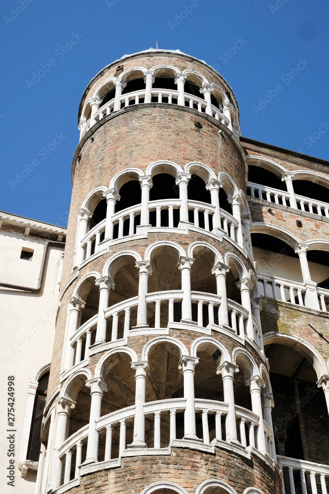 Facade of Palazzo Contarini del Bovolo in Venice, Italy with the famous snail staircase