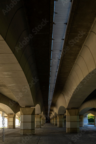 One of the many bridges across old river bed of Turia, turned into famous and beautiful Turia park in Valencia, Spain.