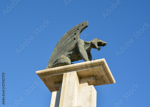Dragon statue on the Puente de Aragon bridge in Valencia, Spain