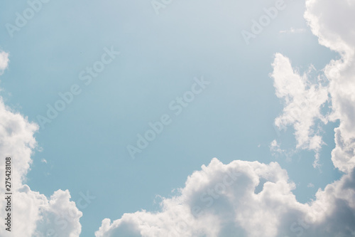 Cloudscape. Close up of summer sky with few clouds. photo