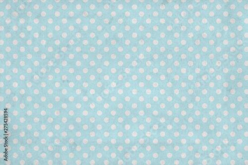 High quality illustration of polka dot wallpaper with white dots and vintage blue background overlaid with grungy elements