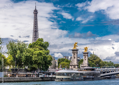 France, 7th arrondissement of Paris, Eiffel Tower, Pont Alexandre III over the Seine river and Rosa Bonheur and Flow barges-restaurant