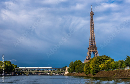 France, 15th arrondissement  of Paris, Eiffel Tower, île aux Cygnes and pont de Bir-Hakeim over the Seine river photo