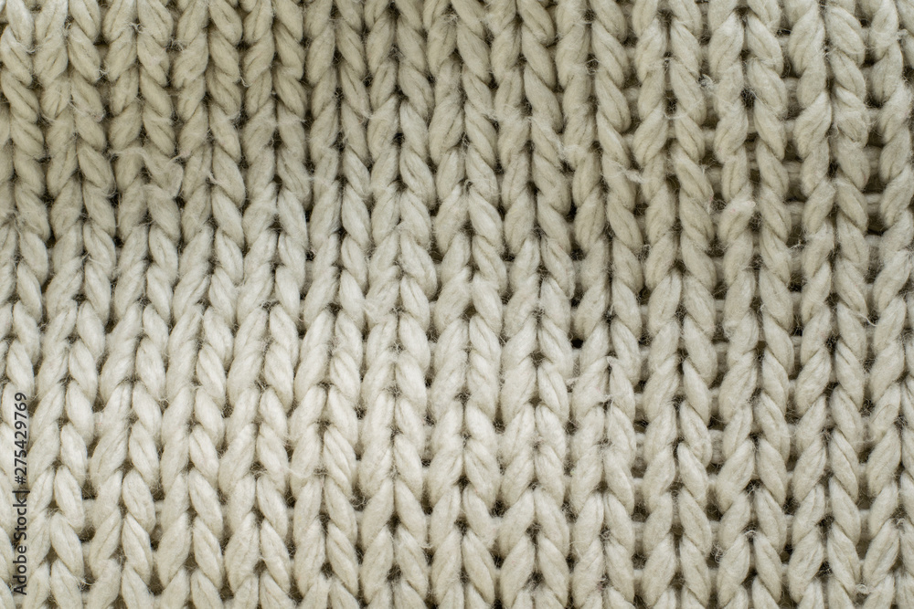 Texture of knit blanket. Large knitting. Plaid wool. Top view Texture of knit blanket. Large knitting. Plaid wool. Top view