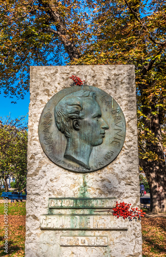 France, Paris, 4th arrondissement, city park of the Saint Jacques Tower (Tour Saint-Jacques) monument dedicated to the memory of the poet Gerard de Nerval (1808-1855) photo