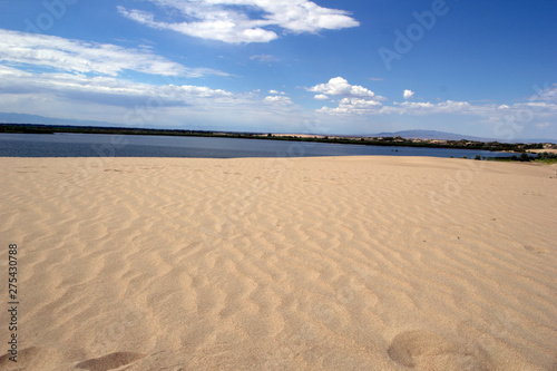 In the middle of the desert and sand there is a lake with the purest water.