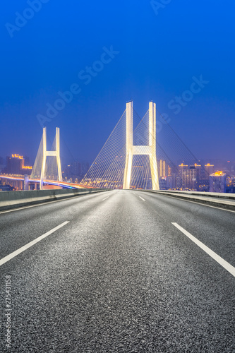 Empty highway and Nanpu bridge at night in Shanghai,China