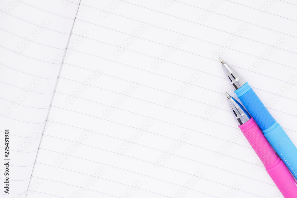 clean sheet of notebook close up, ballpoint pens close up lie on a notebook sheet, place for text, school notebook, business notebook, place to write a text test clean sheet of notebook close up, ballpoint pens close up lie on a notebook sheet, place for text, school notebook, business notebook, place to write a text test