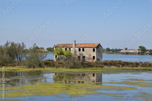 Old uninhabited houses in the Venetian lagoon - Italy