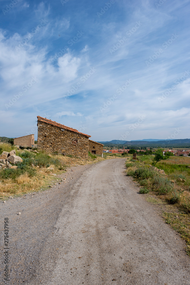 Rural road between mountains of the Sierra de Gudar, Valbona