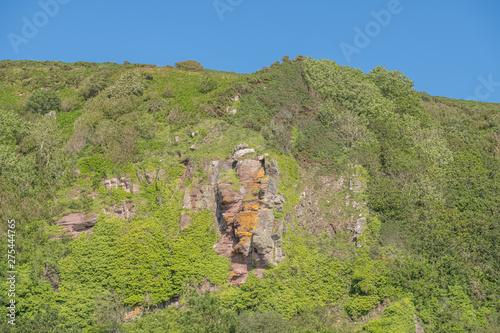 The Holy Caves or  Hawking Craig Cave Situated Above Ground Leval in Portencross on the Summer Solstice in Scotland. photo