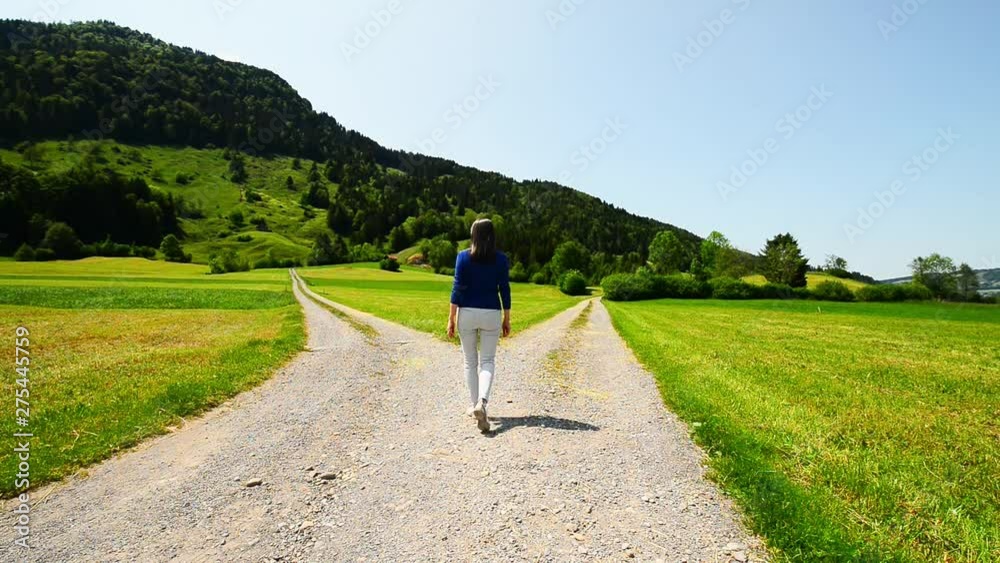 Woman at the intersection of roads. The symbol is to make a choice. Female figure.