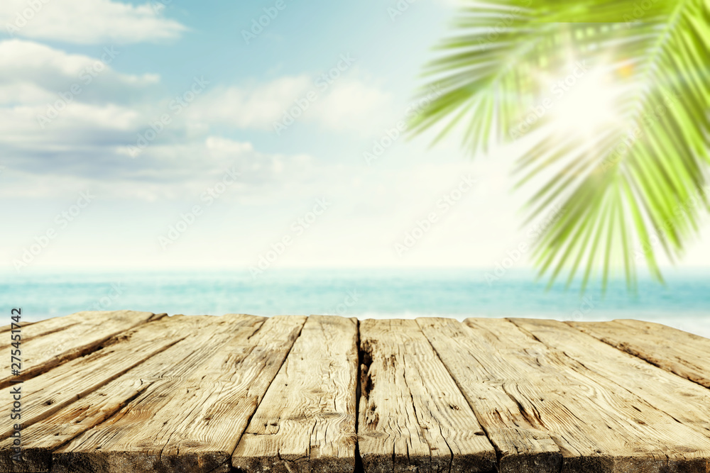 Desk of free space and summer time. Beach landscape and ocean. 