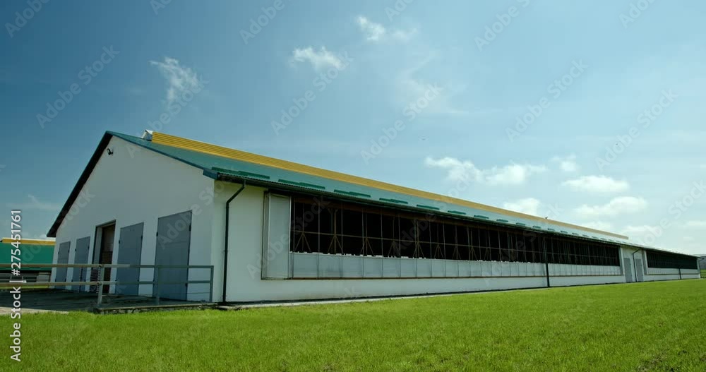 New cowboy in modern style against a background of blue sky with clouds. Wide shot.