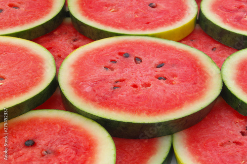 Slices of ripe red watermelon close up