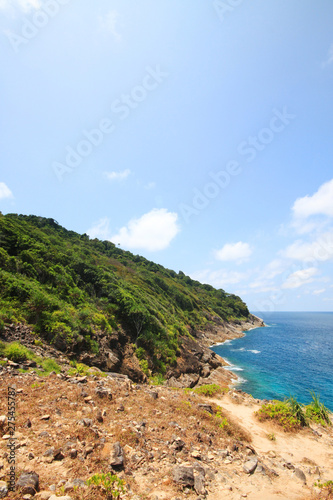 Beautiful paradise in summer of seascape and sea horizon with Calm ocean and blue sky on rock mountain Cape.Tropical Beach plants and jungle island